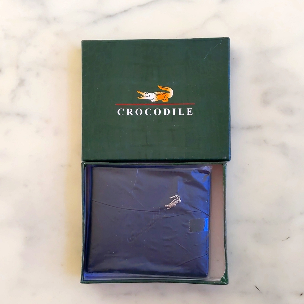 NWT. Crocodile Men's Leather Wallet with Carved Brand Name and Silver Logo.